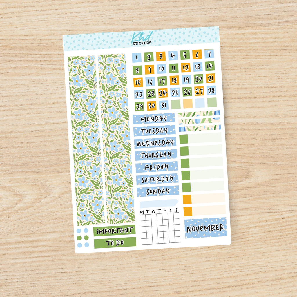 a planner sticker with a floral pattern on it