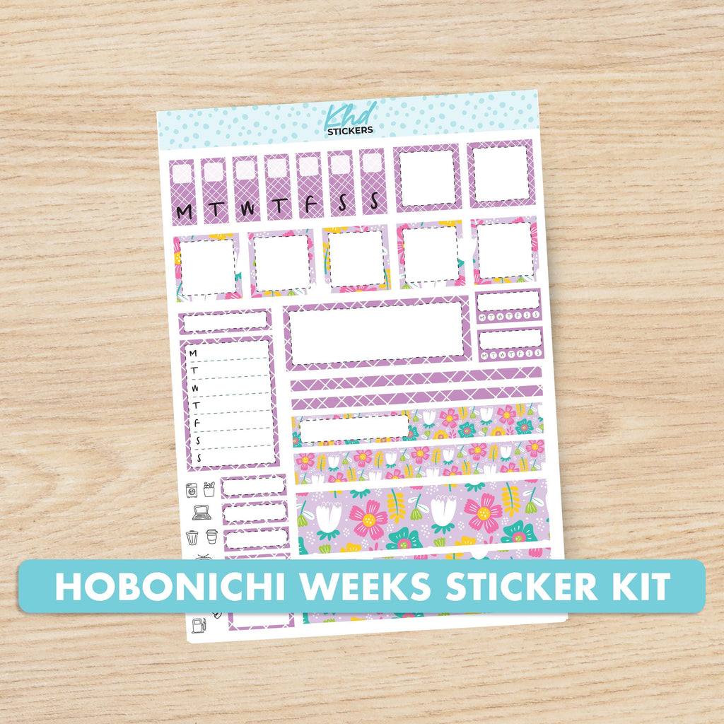 the hobonich weeks sticker kit on a wooden table